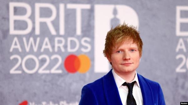 FILE - Ed Sheeran poses as he arrives for the Brit Awards at the O2 Arena in London, Britain, Feb. 8, 2022.