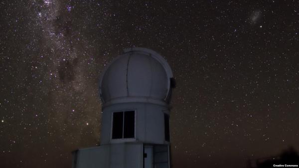 FILE - The SkyMapper telescope sits beneath the Magellanic Clouds at Siding Spring Observatory in 2018. (Bill Roberts/Creative Commons)
Photo courtesty Bill Roberts.