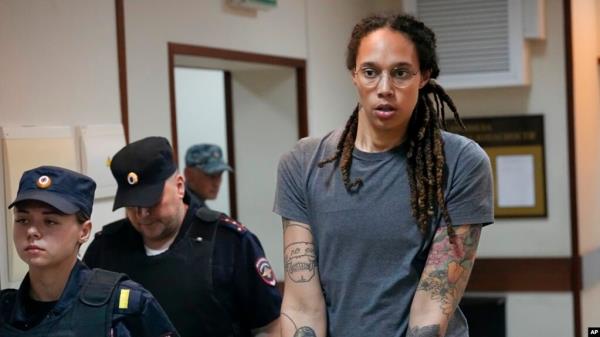 American basketball player Brittney Griner is escorted before a court hearing outside Moscow, Aug. 4, 2022.
