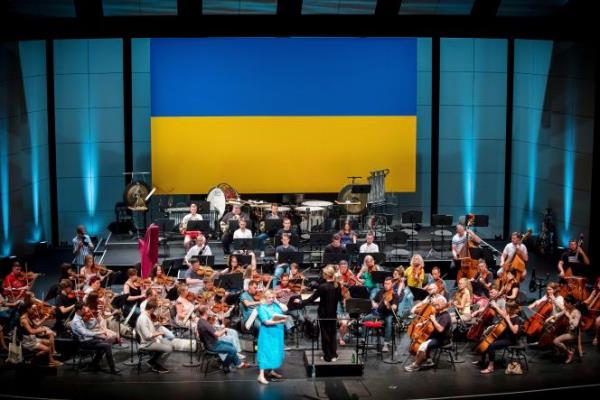 Co<em></em>nductor Keri-Lynn Wilson leads the Ukrainian Freedom Orchestra during rehearsals at the Natio<em></em>nal Opera in Warsaw, Poland, July 26, 2022.