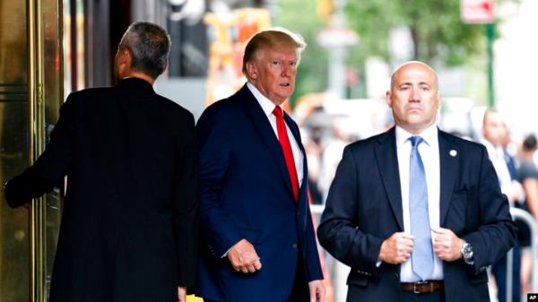 Former President Do<em></em>nald Trump departs Trump Tower, Aug. 10, 2022, in New York, on his way to the New York attorney general's office for a deposition in a civil investigation.